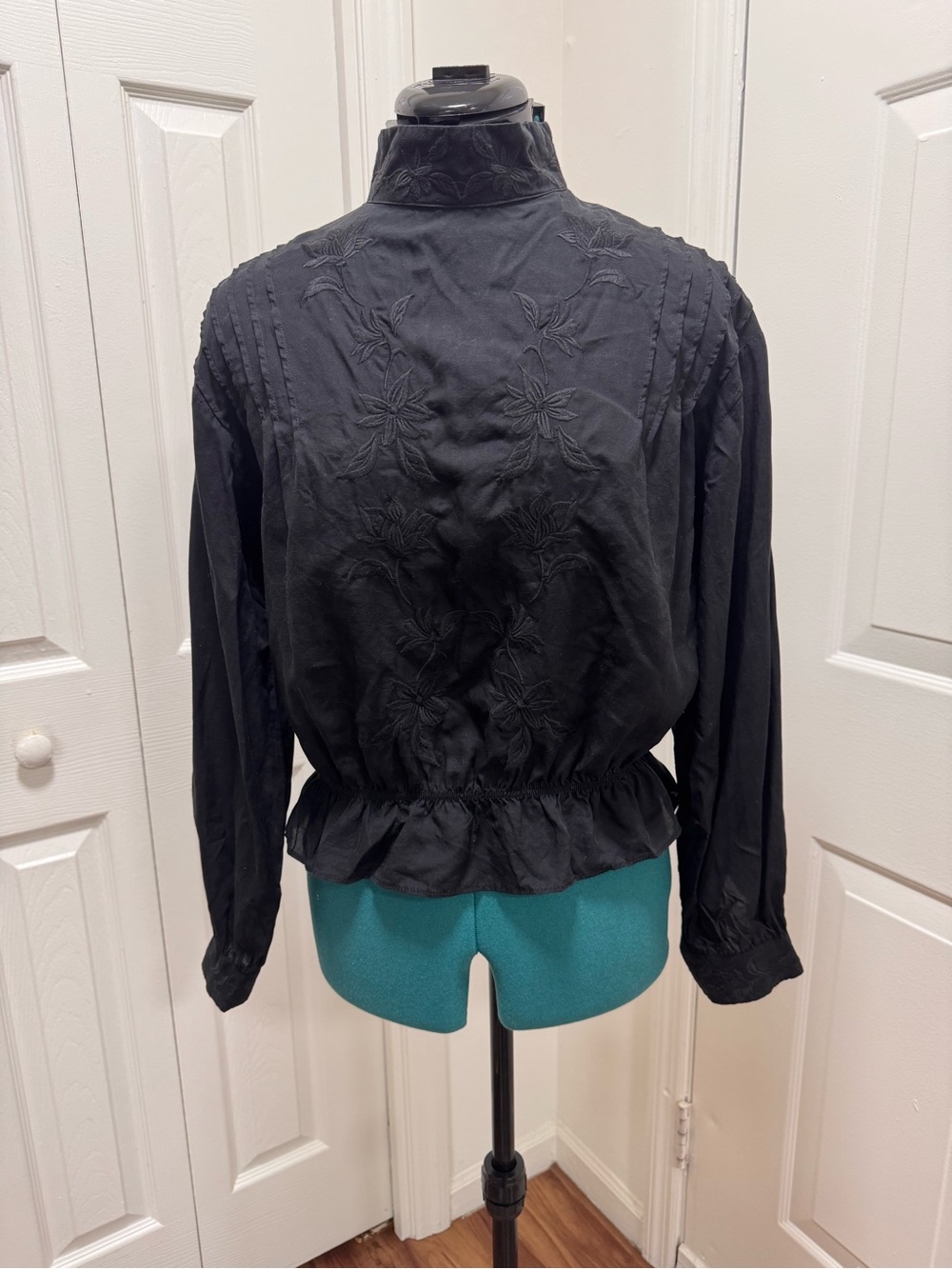 Black Embroidered High-Neck Peplum Blouse